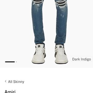 AMIRI Distressed Blue Denim Jeans with Black Hang Tag